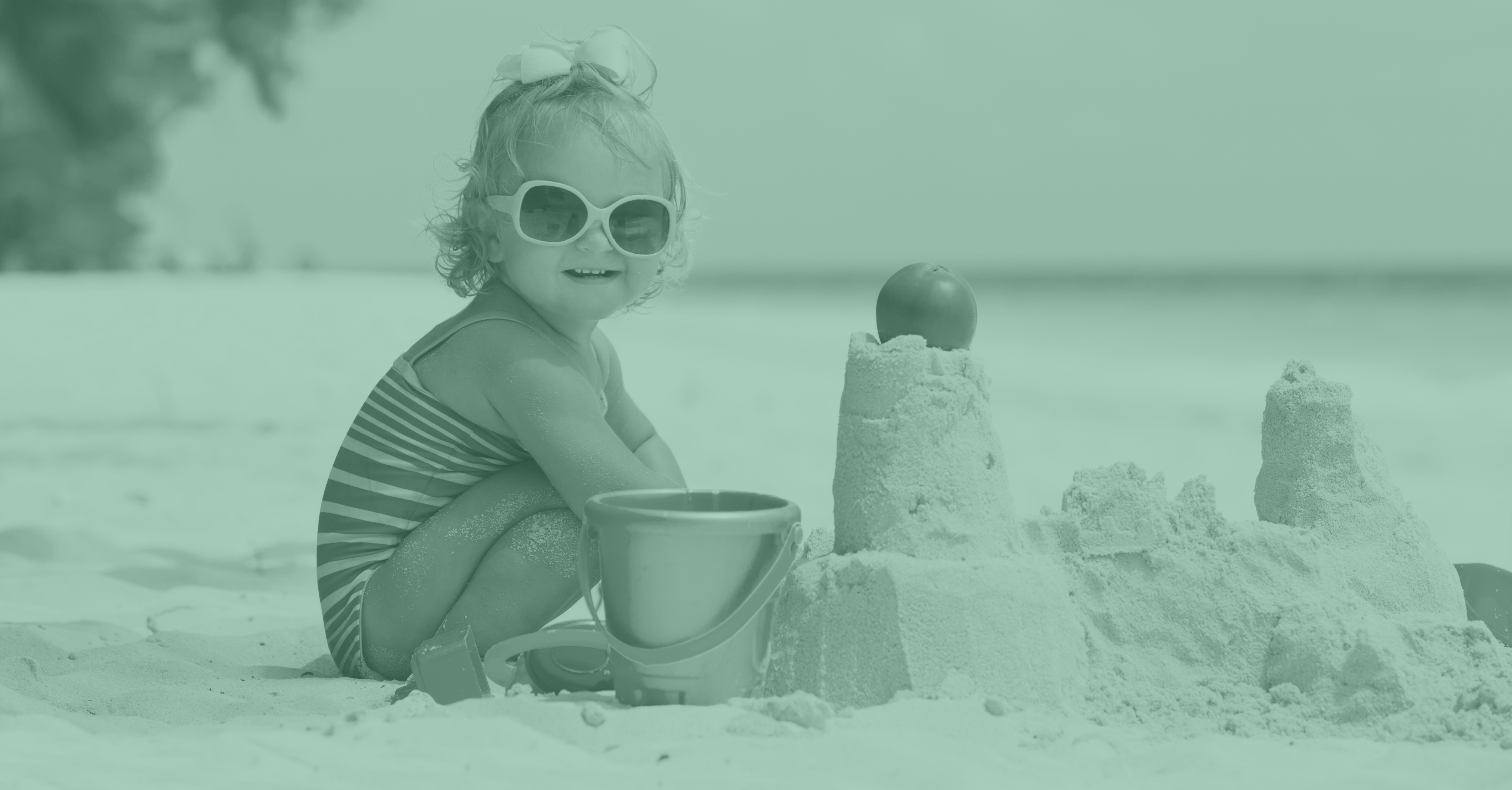 girl with sandcastle